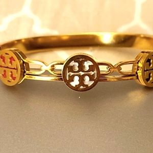 Tory Burch bracelet .